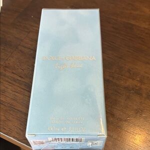 Dolce & Gabbana Light Blue boxed perfume in pale blue with gold logo